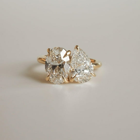 3TCW Pear & Oval Cut Lab Created White Diamond Women's Toi Moi Ring in 14K Yellow Gold Plated