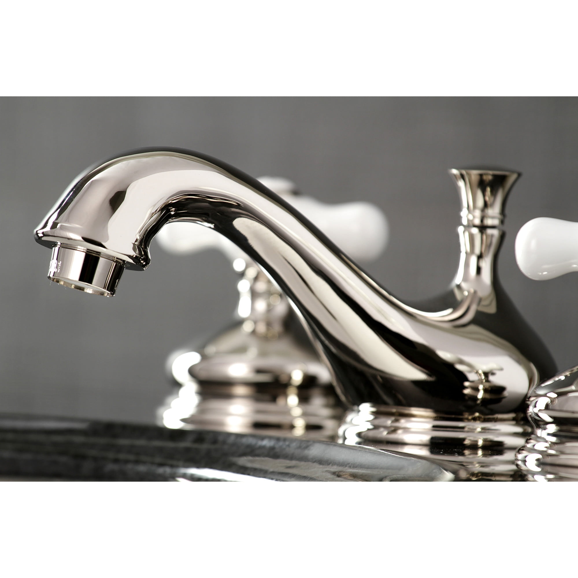 Kingston Brass KS1166PX Heritage Two-Handle 3-Hole Deck Mount Widespread Bathroom Faucet with Brass Pop-Up in Polished Nickel