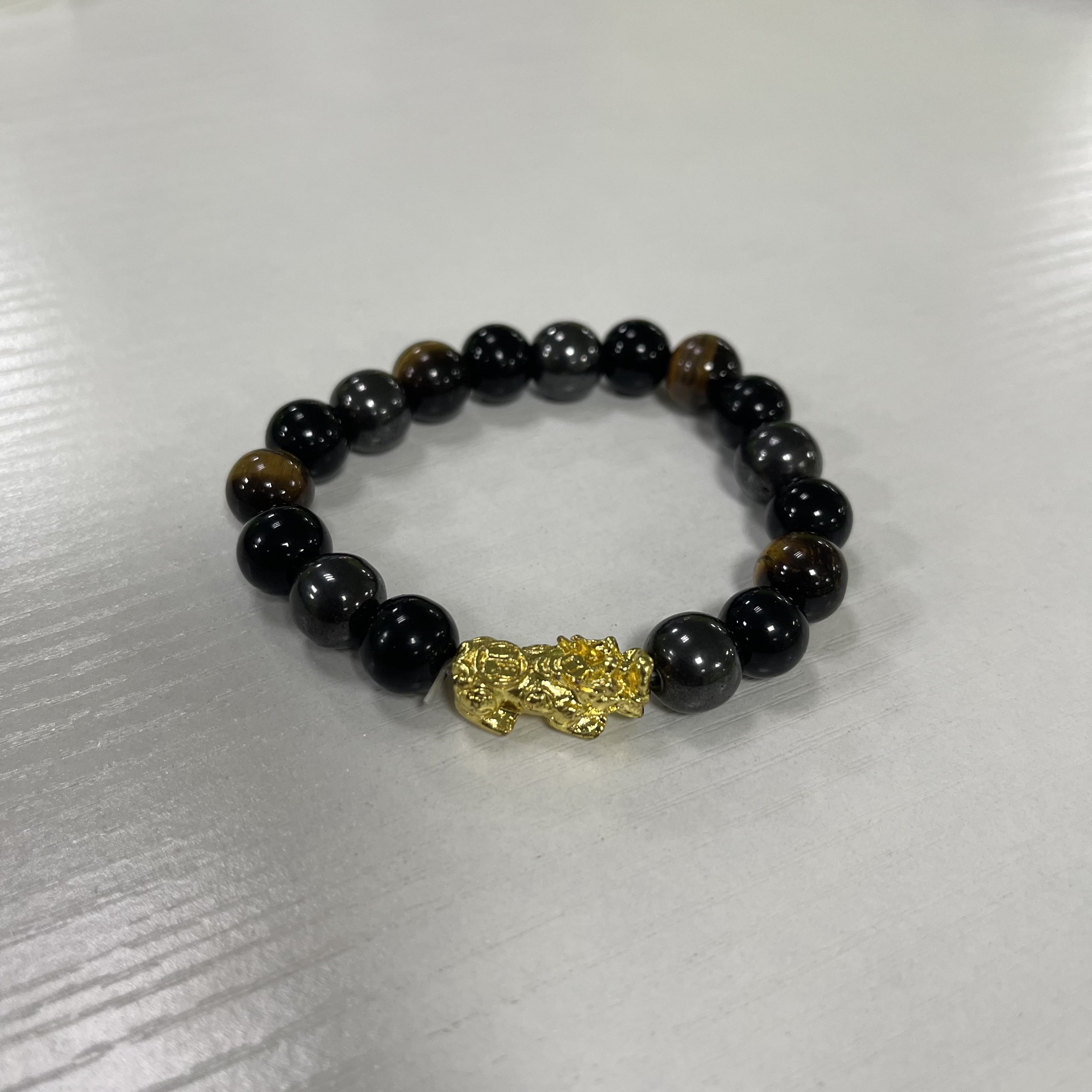 gold dragon and feng shui pearl in black agate Green tiger eye bracelet gold dragon jewel green tiger eye jewel feng shui jewel
