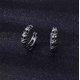 thumbnail image 2 of Pendientes de calavera gótica para hombre, aretes Huggie de acero médico para hombre, joyería perforada en espiral negra Punk JM, 2 of 3