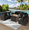 Black, variant on Gaildon 9 Piece Patio Furniture Set with Fire Pit Table, All Weather Outdoor Sectional PE Rattan, Patio Conversation Sets with Cushions and Glass Coffee Table for Garden Lawn Balcony Porch Deck, Red