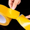 thumbnail image 3 of HOMEMAXS Golden Double Sided Tape for Crafts with Fiberglass Mesh Strong Adhesion and Wide Applications 1 Roll, 3 of 8