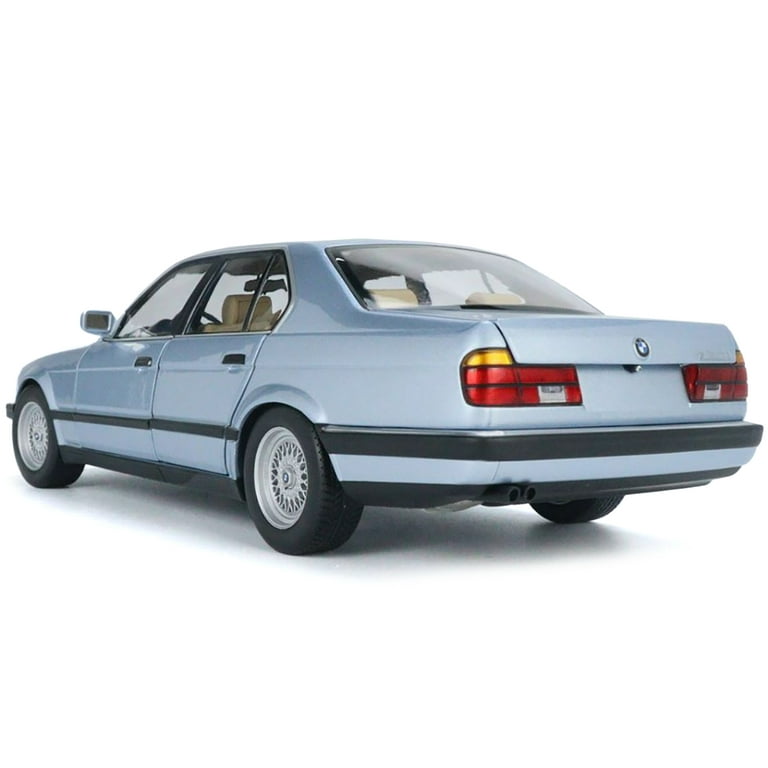 Diecast 1986 BMW 730i (E32) Light Blue Metallic 1/18 Diecast Model Car by  Minichamps 