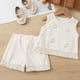 thumbnail image 1 of Conjunto de camiseta sin mangas con cuello redondo para niña, vestido sin mangas con botones finos para niña, falda francesa ceñida con cintura fruncida y volantes, conjunto de poliéster para niña, 1 of 6