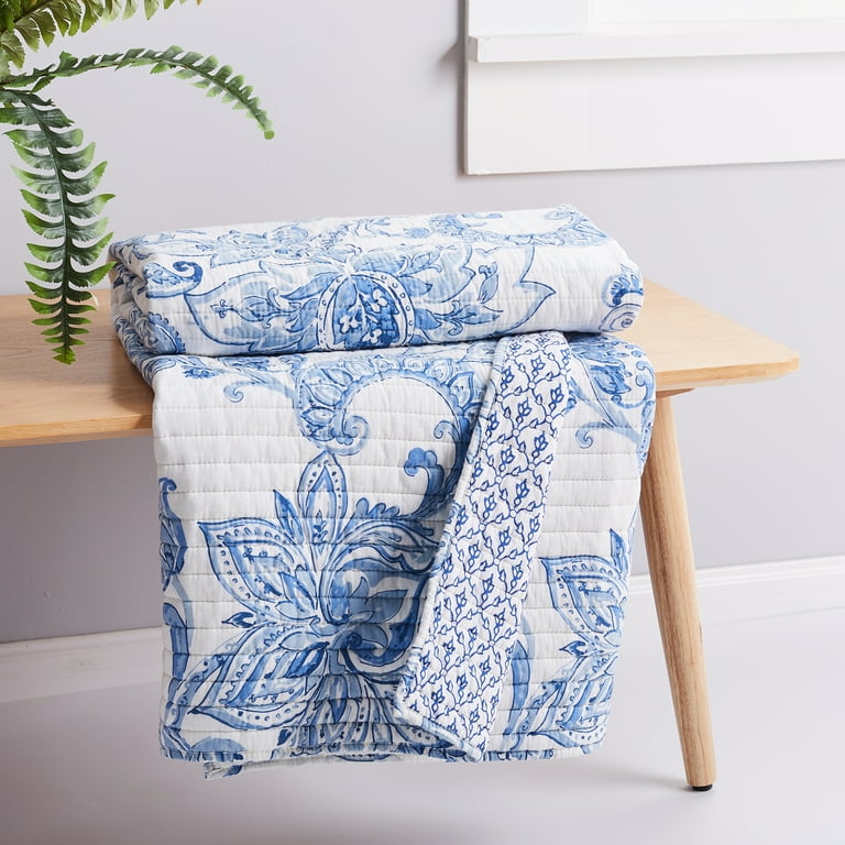 Blue quilted throw shop