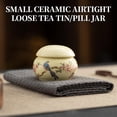 thumbnail image 5 of 1Pack  Mini Ceramic Tea Canister – Handpainted Bird & Peach Blossom Design, 2.16″ Diameter, Airtight Lid for Tea, Spices or Small Trinkets ﻿, 5 of 10