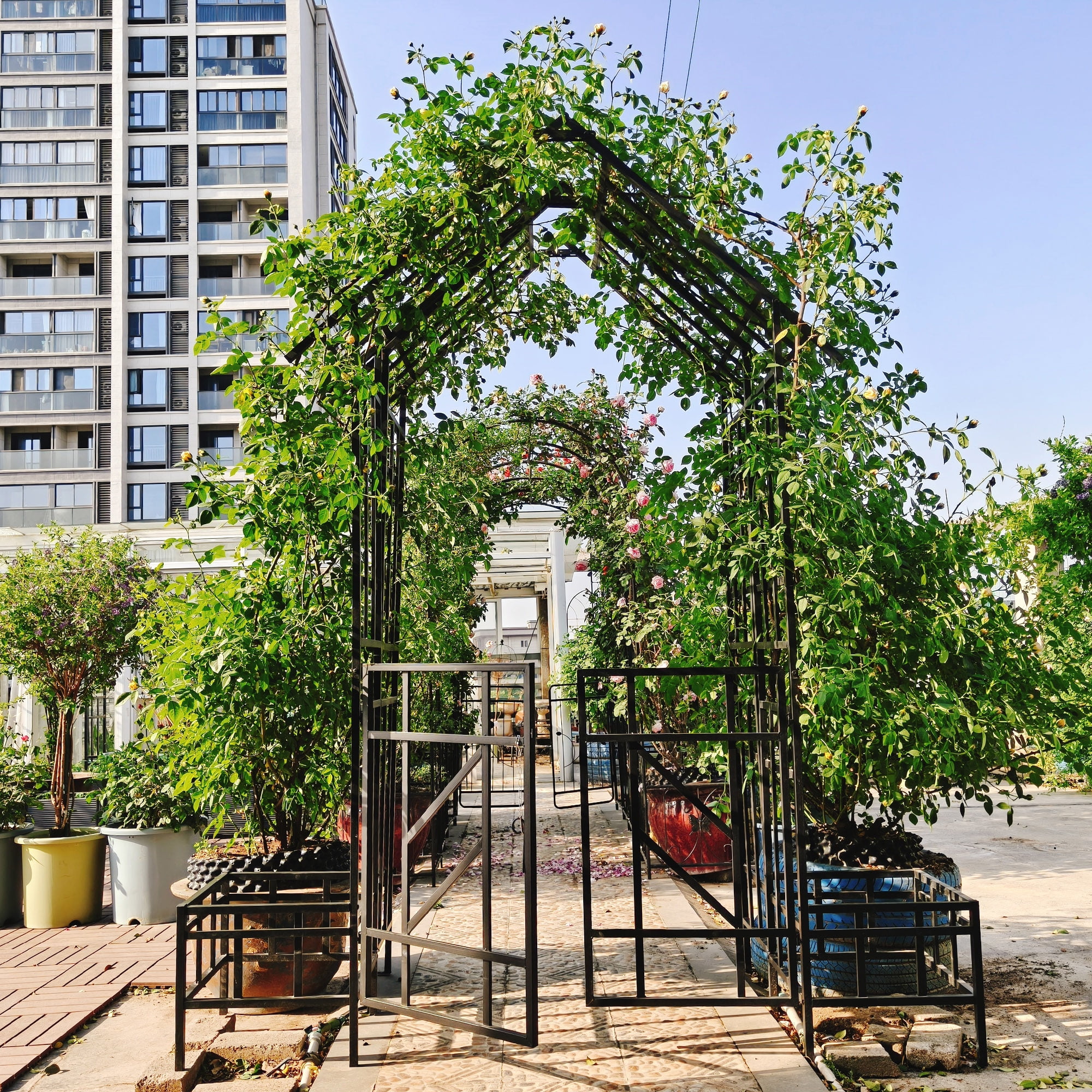 Yoneston 97.24" H Metal Garden Arbor with Gate and Planter, Garden Arch for Climbing Plants Support Rose Arch for Outdoor, Black