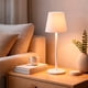 thumbnail image 4 of Ilios Innova | Lámpara de Mesa LED Minimalista Blanca con Botón Táctil Superior, Diseño Moderno Recargable, Luz Decorativa para Sala, Recámara u Oficina, Estilo Funcional y Compacto, 4 of 9