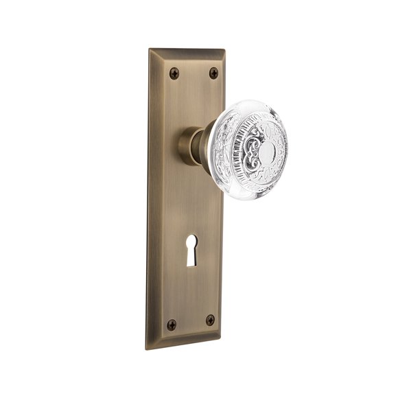 Nostalgic Warehouse 750603 Passage New York Plate with Keyhole Crystal Egg and Dart Knob, 2.75", Antique Brass