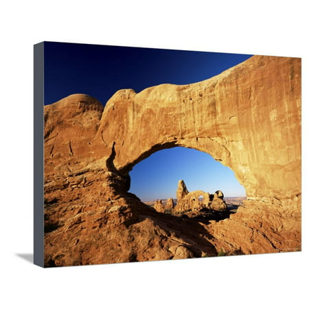 Turret Arch Through North Window at Sunrise, Arches National Park, Moab, Utah, USA Stretched Canvas Print Wall Art By Lee