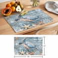 thumbnail image 6 of Blue Turtle Coastal Placemats Set of 6 Summer Beach Nautical Starfish Coral Place Mats Indoor Wipeable Table Mats Washable Cloth Dining Table Placemats for Kitchen Holiday Party Home Decor 13x19 Inch, 6 of 9