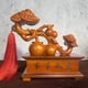thumbnail image 2 of Rosewood carved persimmon symbolizing good fortune and auspiciousness; solid wood ornament for home, living room, TV stand, or office decoration., 2 of 4