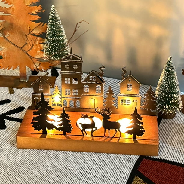 Adornos navideños, regalos navideños. Elegante candelabro navideño de hierro con forma de ciervo y árbol. Atractiva decoración navideña de mesa con un ambiente luminoso para el hogar. Decoración navid