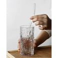 thumbnail image 2 of 12 reusable borosilicate glass straws and brushes, measuring 7 inches x 8 millimeters, including 10 elbows and 2 straw brushes. Reusable straw brushes for juice, coffee, and cocktails, 2 of 7