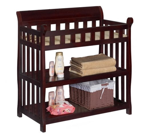 How long did it take for that walnut table to even out after changing color (the one you put the light on)? delta children eclipse changing table with pad espresso cherry