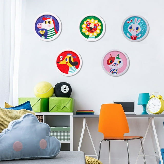5D DIY Mini Diamond Painting Pen Canvas Kit Cross-stitch Children Acrylic Rhinestones Embroidery Educational Toy Art with Frame Type 8. The image shows five circular framed diamond paintings featuring colourful animal designs, including a cow, lion, rabbit, dog, and cat, displayed on a white wall in a vibrant children's room. The room includes a desk, orange chair, and playful decor like a cloud-shaped pillow and colourful storage boxes.