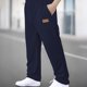 thumbnail image 1 of Pantalones largos para hombre, lisos, a la moda, informales, con bolsillos, cintura elástica, pantalones deportivos largos de poliéster para hombre., 1 of 9