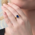 thumbnail image 4 of Gem Stone King 18K Yellow Gold Plated Silver Blue Created Sapphire Solitaire Engagement Ring for Women (2.30 Cttw, Oval 9X7MM, Gemstone September Birthstone, Available in Size 5, 6, 7, 8, 9), 4 of 4