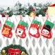 thumbnail image 3 of Medias navideñas (juego de 4): incluye muñeco de nieve, oso polar, Papá Noel y reno, rojo y verde, con detalles en copos de nieve, 3 of 5