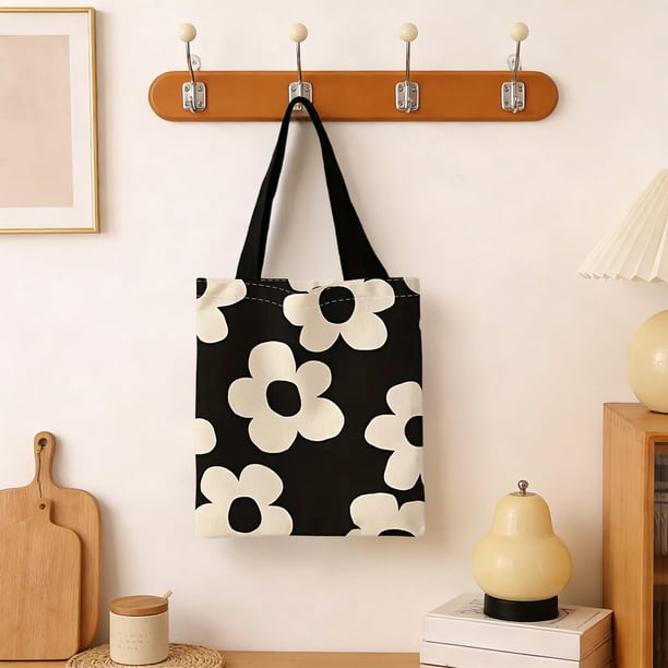 Elegante bolso de lona esencial para salir. Lo tiene todo. Bolso de lona.