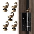 thumbnail image 1 of Tope decorativo para bisagra de puerta WLHYHH, set magnético de ganso en bronce, 1 of 7