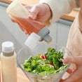 thumbnail image 2 of Botella Exprimible con 5 Agujeros para Condimentos, para Cocina, Ketchup, Mostaza, Mayonesa, Dispensador de Miel, Recipiente para Almacenar Salsas A, 2 of 5