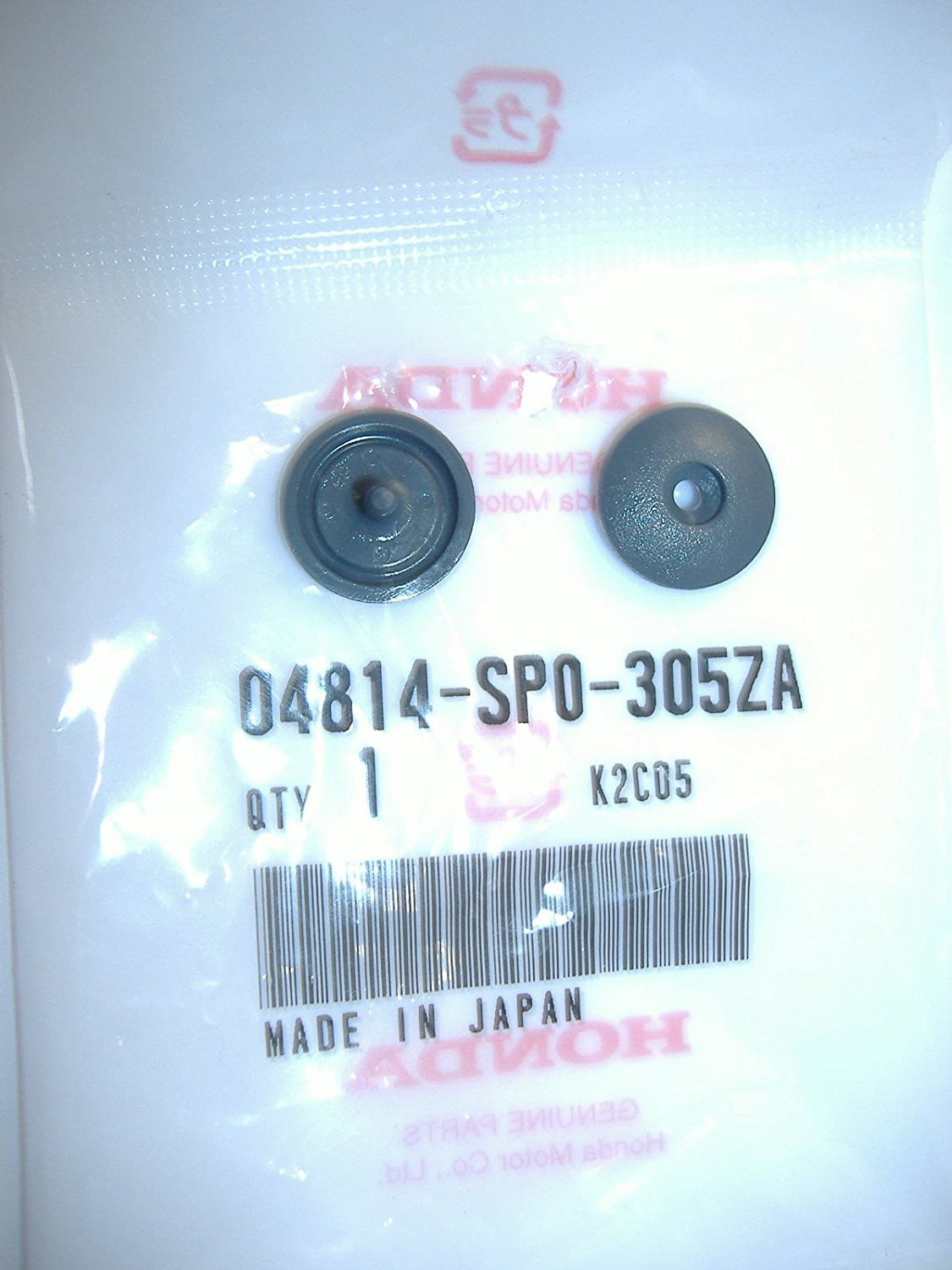 tan seat belt stop button
