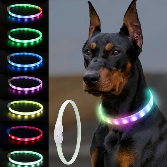 WIFKLSIIPG LED multi-color dog collar with rechargeable 7-color changing lights, shown on a black dog. The collar features bright LED lights in green, blue, purple, and red, with adjustable flashing modes for dog safety and night visibility. Made of silicone and ABS material, it is waterproof and visible up to 500m, ideal for outdoor use. Includes a USB rechargeable battery lasting up to 5 hours.