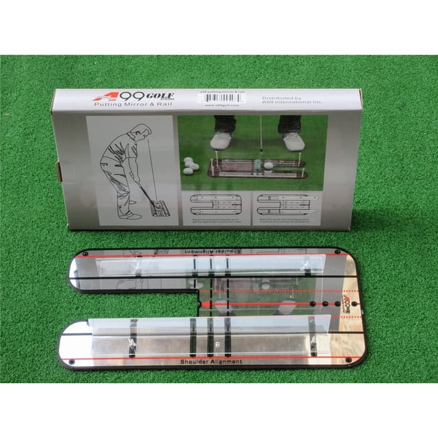 A99 Golf Putting Alignment Mirror & Rail, a portable training aid measuring 17 1/2 inches by 9 1/4 inches, designed to improve putting posture and alignment. The transparent rail features movable fixing locations and a mirror plane for full views of putting alignment, shoulder alignment, and face alignment. Includes a guide rail function for practicing putter gate drill skills. Displayed on a green surface with packaging in the background showing usage instructions and product details.