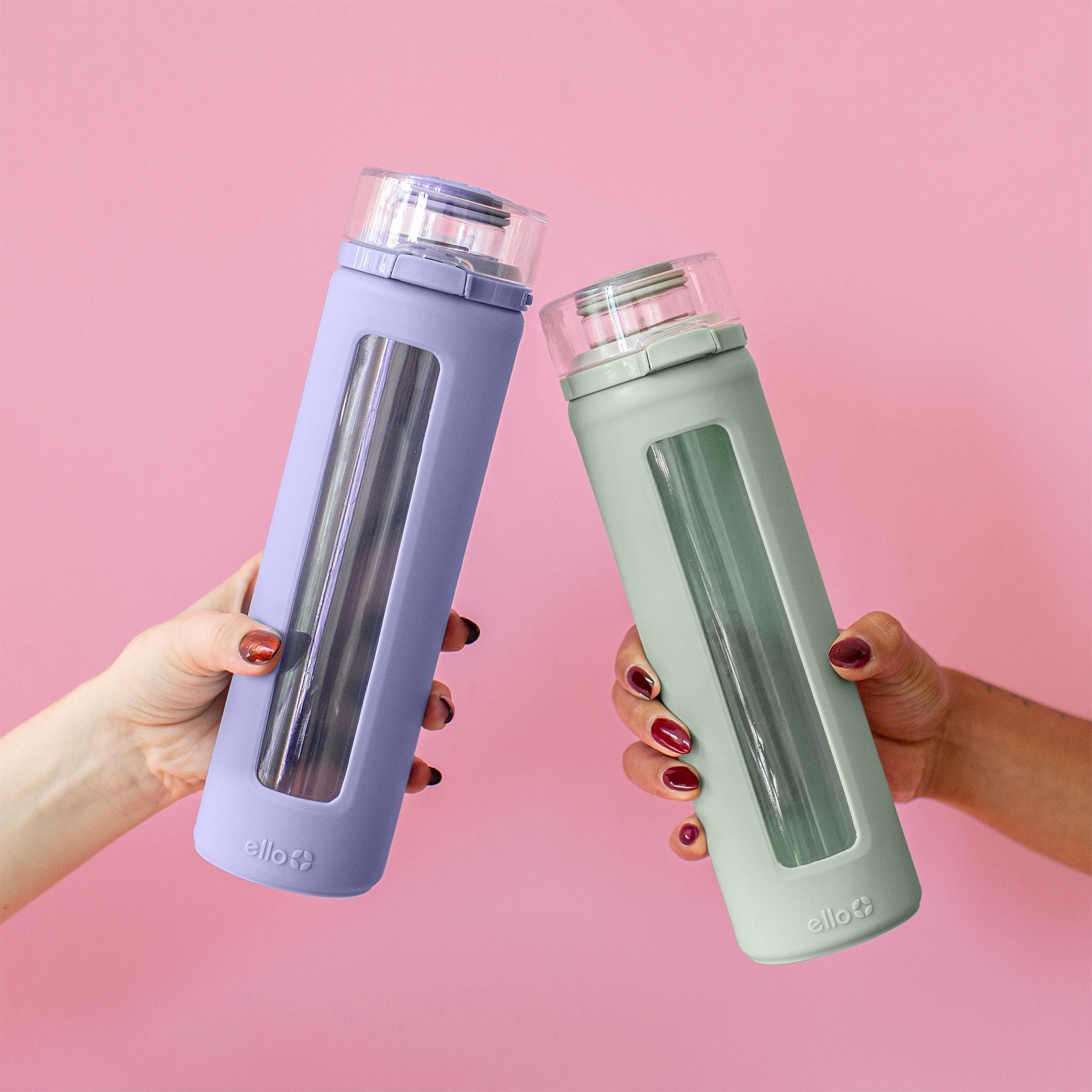 Ello Clara 20oz Reusable Glass Water Bottle with One-Touch Leak Proof Flip Lid, Protective Non-Slip Silicone Sleeve, Carry Loop for Coffee, Tea and Water, BPA-free, Dishwasher Safe, Tropical Violet