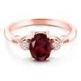 thumbnail image 2 of Gem Stone King 18K Rose Gold Plated Silver Red Rhodolite Garnet and White Moissanite 3-Stone Rings for Women (1.43 Cttw, Gemstone January Birthstone, Oval 8X6MM, Available in Size 5, 6, 7, 8, 9), 2 of 5
