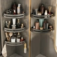 thumbnail image 1 of Estante de esquina de baño triangular, Estante de almacenamiento montado en la pared sin taladro, Plástico negro, 11.8x8.4x2.1 pulgadas, Organizador de ahorro de espacio para artículos de tocador, 1 of 5
