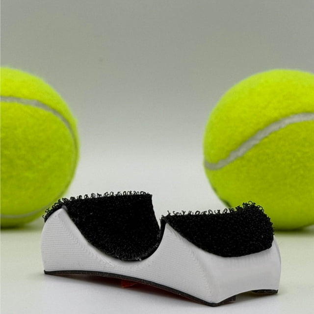 Aodebiao **Tennis Ball Picker Upper Tool, Hands Free No Bend Tennis Ball Retriever Attachment for Racket Handle, Portable Pick Up Aid for Seniors Coach Practice Training Accessories** \n(字符数:192)