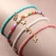thumbnail image 2 of 4 piezas de cuentas bohemias multicapa tobillera colorida para mujer tobillera con colgante de luna y estrella pulsera de cuentas elástica para pie joyería de playa de verano, 2 of 5