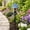 Light Blue, variant on Solar Garden House Stake Light, Outdoor Decorative Resin Cottage with Solar Panel, Textured Roof and Warm Evening Glow for Patio, Flower Beds, Planters and Yard Display