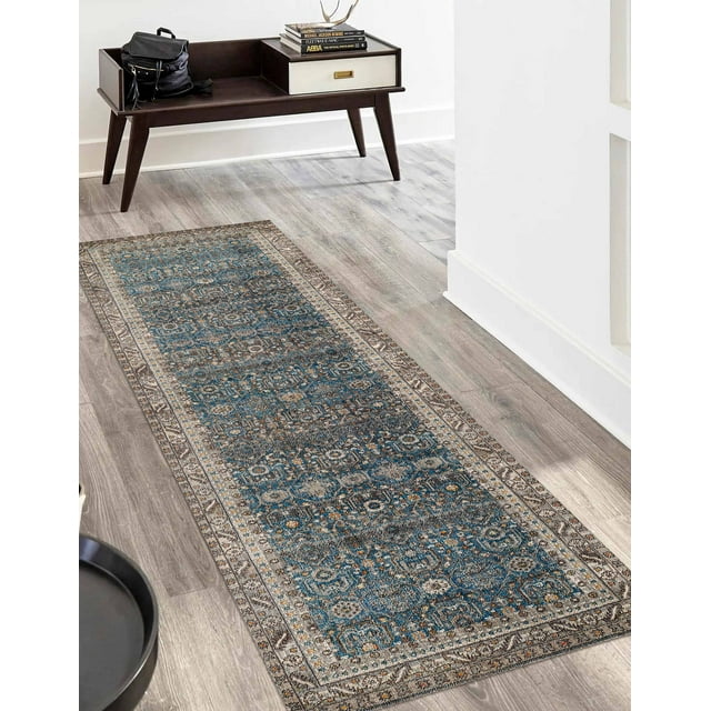 ECARPET Gianna traditional runner rug featuring detailed blue and beige floral motifs, placed on light wood flooring in an entryway with mid-century modern furniture.
