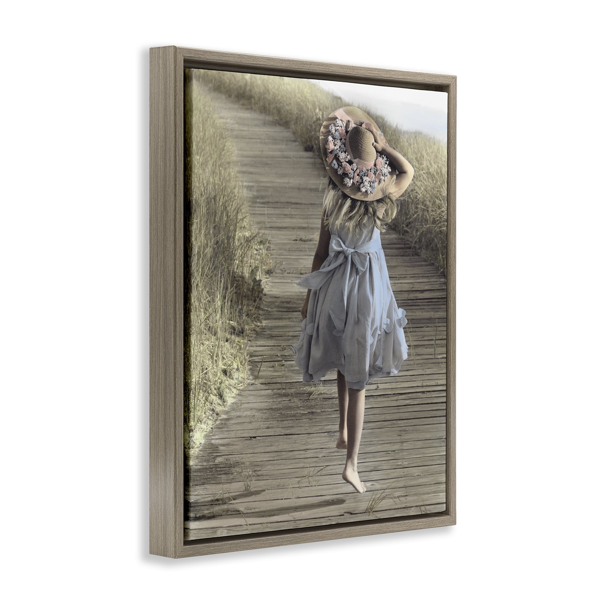 Stupell Industries Girl With Sun Hat Walking Brown Framed Floater Canvas Wall Art, design by Kendra Dew