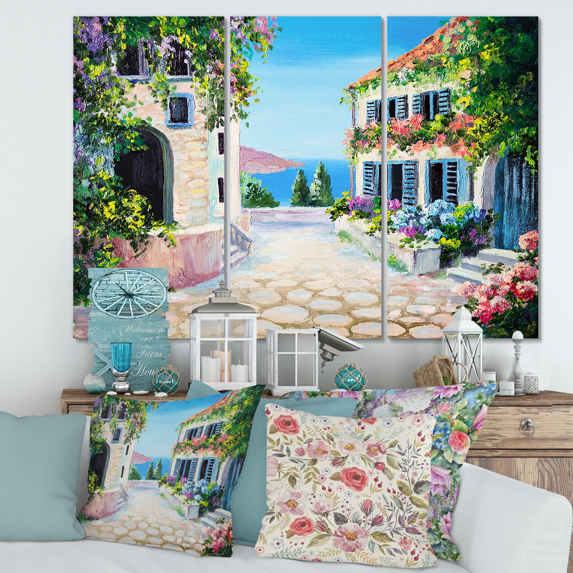 Designart ' Blossoming Flowers With White Houses With Near The Sea ' Nautical & Coastal Canvas Wall Art Print