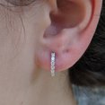 thumbnail image 2 of TwoBirch Round Prong Cubic Zirconia Huggie Hoops in 14k White Gold Plated Silver, 2 of 4