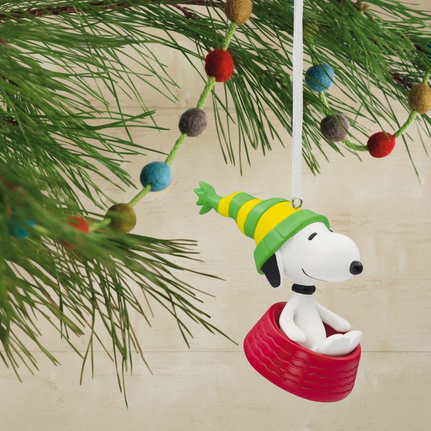 Hallmark Peanuts Snoopy Sledding in Dog Bowl Christmas Ornament