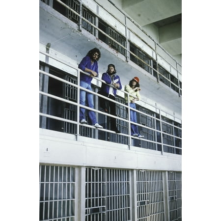 the Bee Gees in a prison cell Photo Print