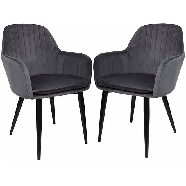 sillon tapizado terciopelo rack & pack eames gris terciopelo sala habitación Par de sillas Eames en gris terciopelo, vista frontal 3/4; respaldo curvo con costuras verticales, apoyabrazos integrados y cojines de asiento removibles aptos para lavado. Patas cónicas negras con núcleo metálico y tornillería para montaje; diseño para uso interior en sala, comedor u oficina, soporta hasta 90 kg. También suelen usarse como asiento extra en áreas de espera.