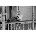 thumbnail image 2 of Reading A Good Book. Middle Age Man Reading On His Front Porch On A Sunday Afternoon In July 1941. Vincennes History (, 2 of 2