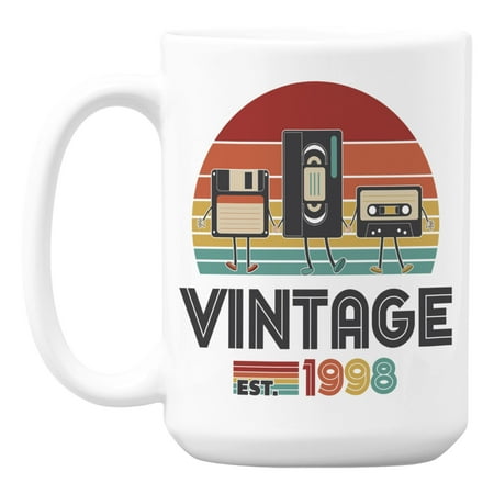 

Vintage Est. 1998 feat. Cassette Tape & Diskette Ceramic Coffee & Tea Mug (15oz)