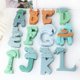 thumbnail image 2 of Molde de silicona con letras temáticas de Navidad 3D, 26 letras del alfabeto inglés, arte DIY, vela, jabón de yeso, pastel, hornear, decoración de fiesta de navidad, 2 of 4