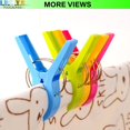 thumbnail image 3 of Large set of plastic clips for hanging, 12 cm large beach towel holders, sun loungers, pool chairs, laundry to prevent clothespins from, 3 of 3