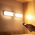 thumbnail image 1 of Luz LED con sensor de movimiento a batería - Iluminación inalámbrica y regulable para debajo de gabinetes de cocina, armarios, roperos y escaleras - Blanco, 29 cm, 1 of 7