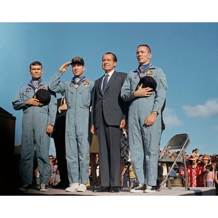 Presidential Medal Of Freedom President Richard Nixon And The Apollo 13 Crew Salute US Flag The Astronauts John Swigert Jim Lovell And Fred W Haise Were Presented The Presidential Medal Of Freedom During The Post-Mission Ceremonie ()
