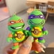thumbnail image 5 of LLavero de Tortugas Ninja Mutantes adolescentes de Anime para niño, colgante de mochila escolar, llavero de coche genial, accesorios de bolsa, regalos para niños y adultos, 5 of 5