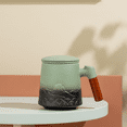 thumbnail image 5 of ZENS Ceramic Tea Cup with infuser and lid, 16.8 OZ Black&light Green Embossed, 5 of 9